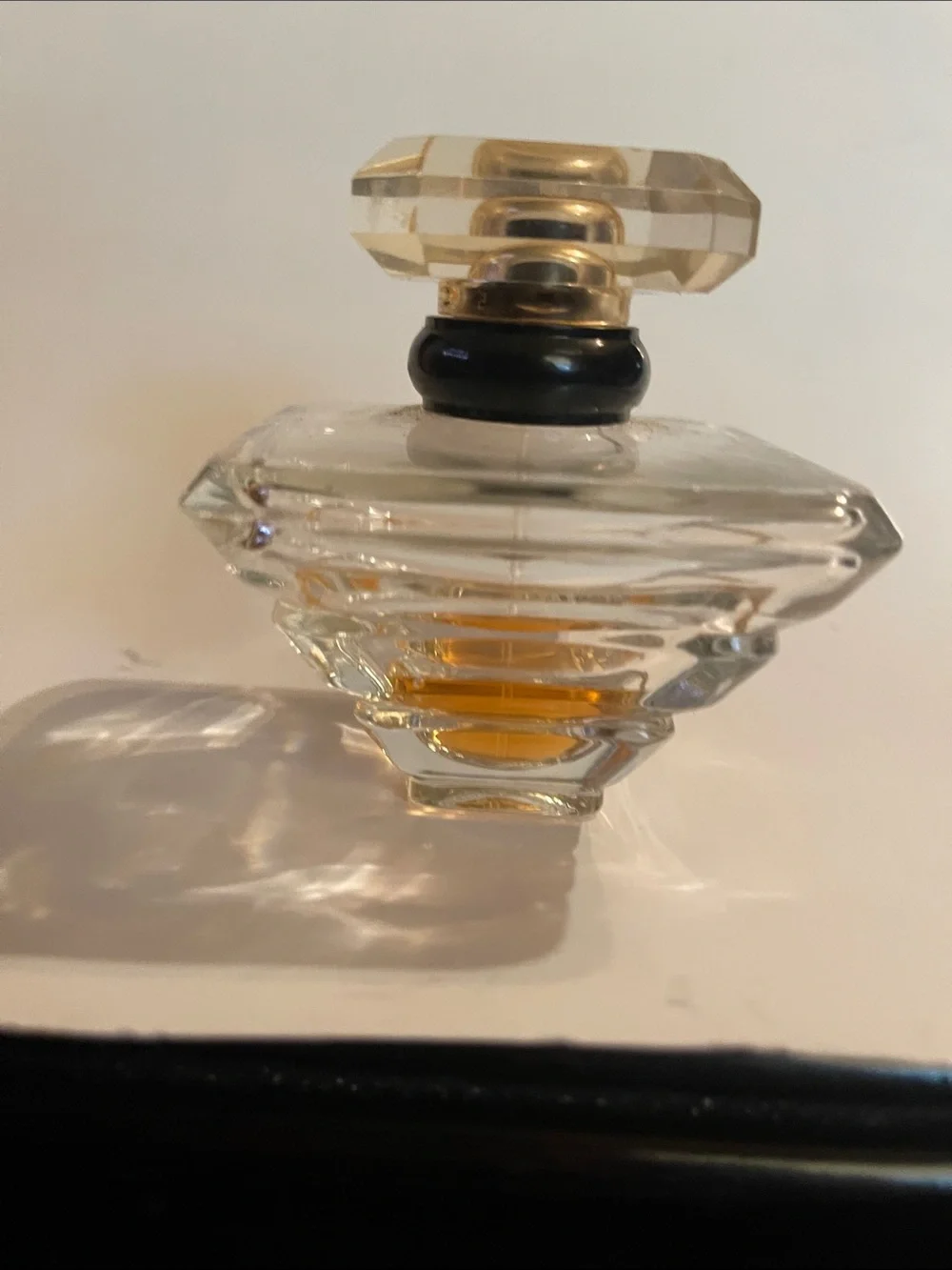 Trésor by Lancôme 1/4 if a 1.7 fl oz bottle